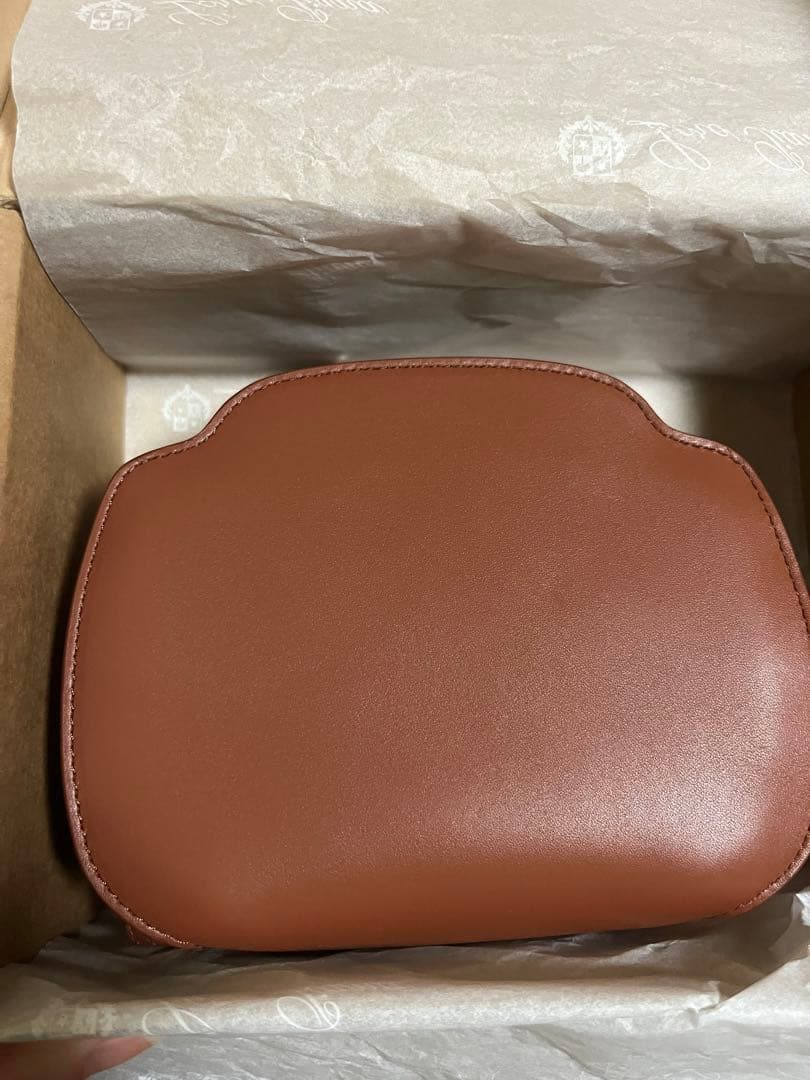 Reverse of the cognac scalloped pouch