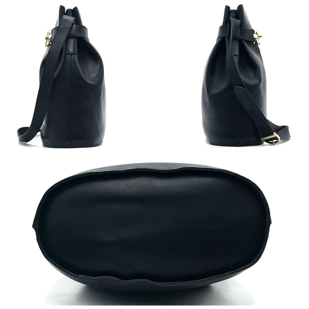 Side and base views of the black leather bucket bag