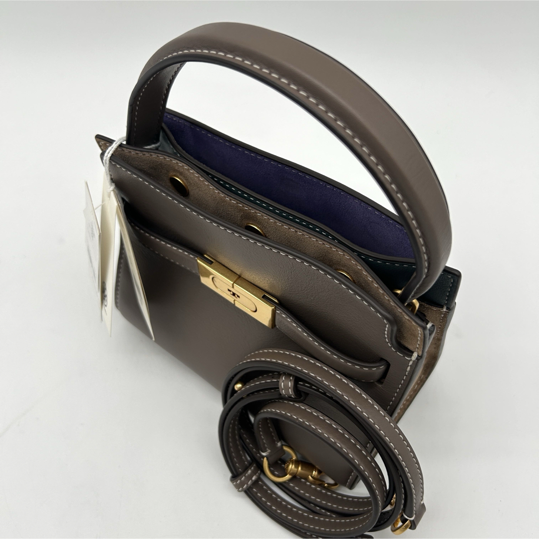 Open view of the taupe top-handle bag