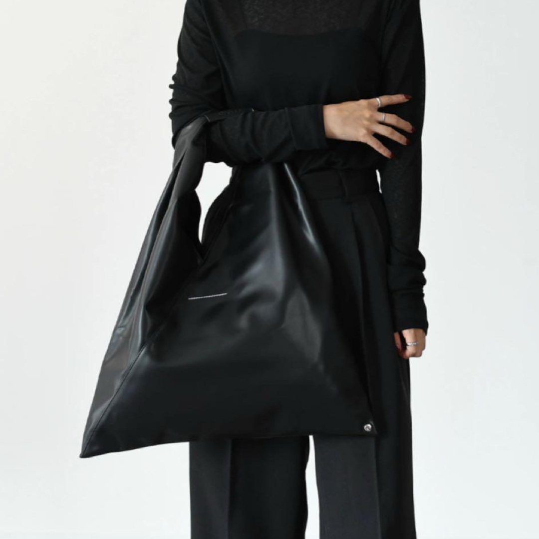 Black Japanese tote shown at full carrying scale
