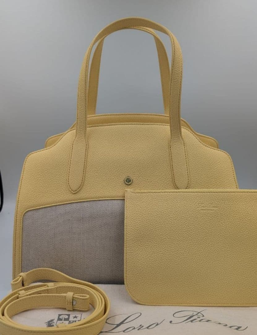 Yellow Loro Piana tote with detachable strap and matching pouch