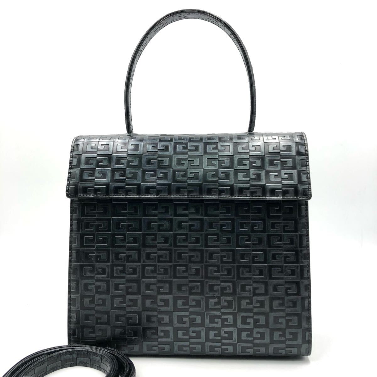 Black Givenchy top-handle bag embossed with a repeating 4G pattern