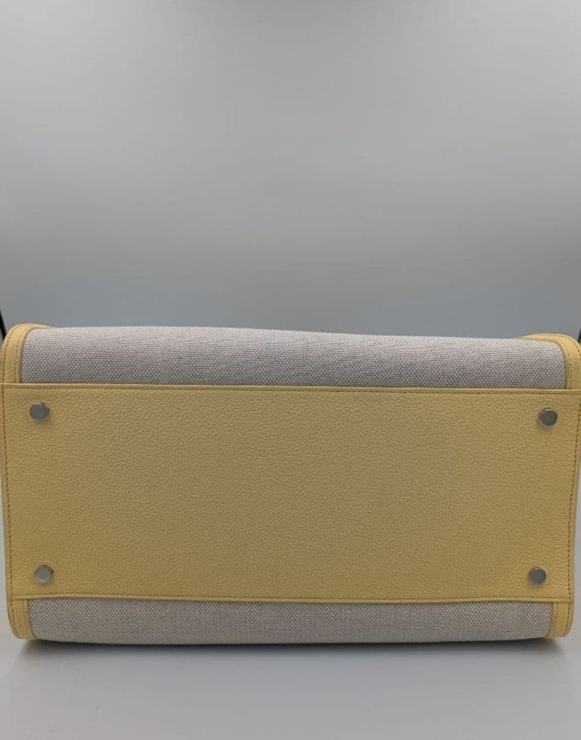 Back and base view of the yellow canvas tote
