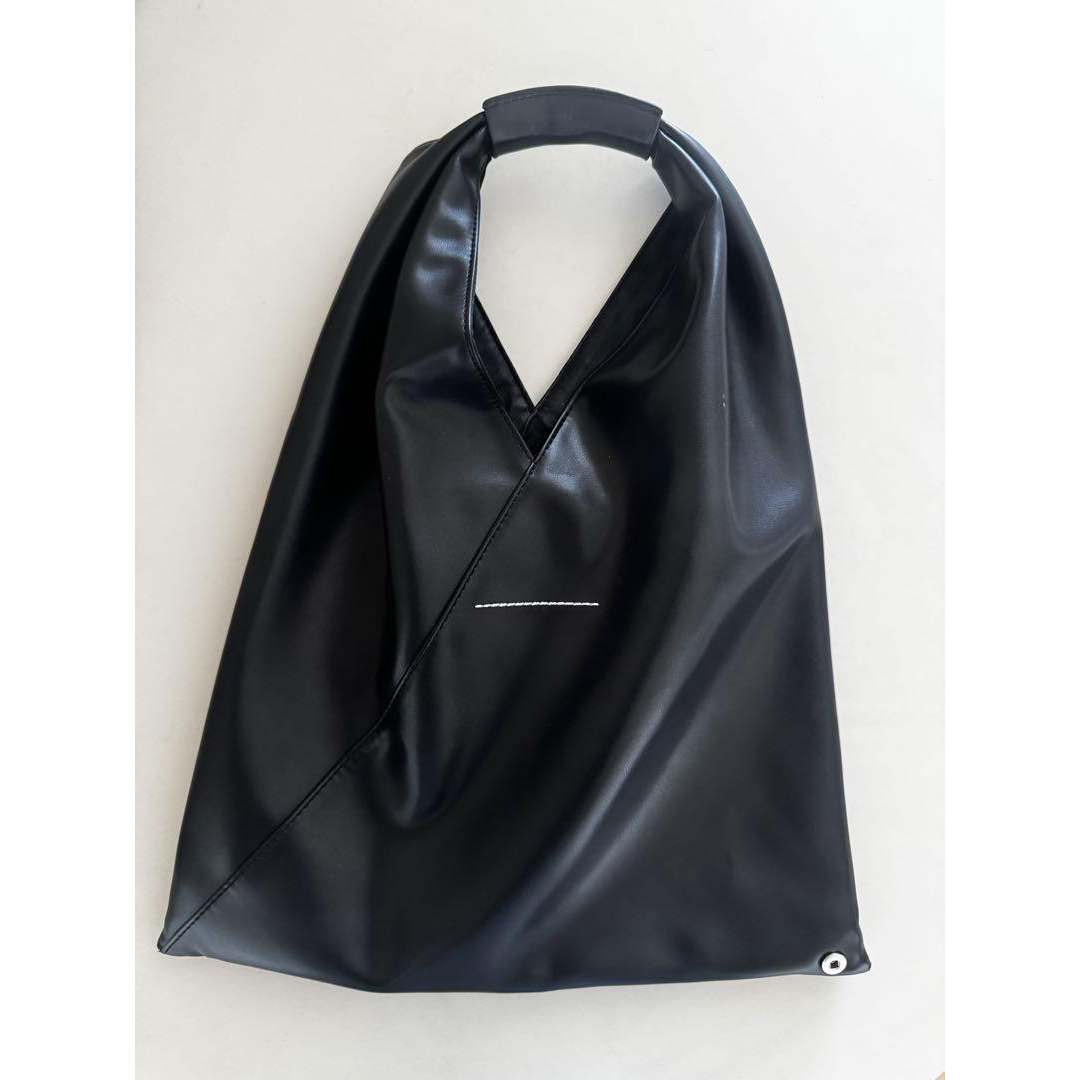Black MM6 Japanese tote with triangular silhouette