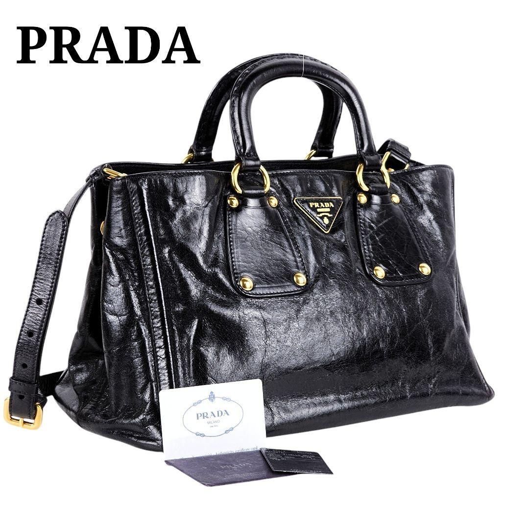 Detailed front product shot of the black glossy bag