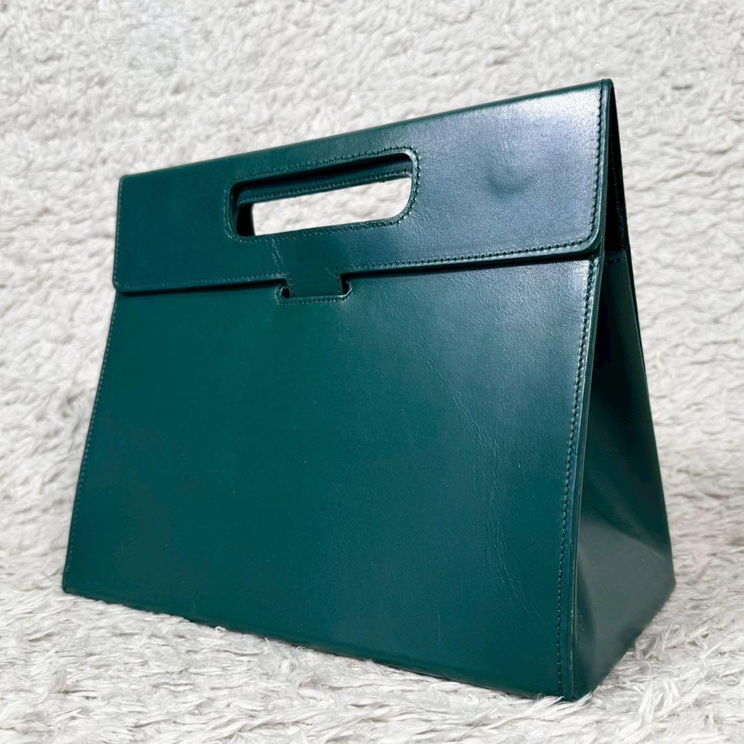 Detailed view of the green cut-out handle tote