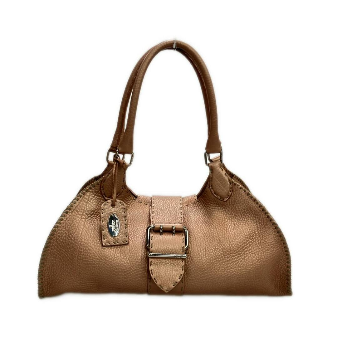 Front view of the tan pebbled leather dome bag